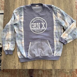 Reworked up-cycled sweatshirt with flannel sleeves and kangaroo pocket.